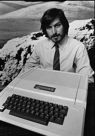 man holding a typewriter